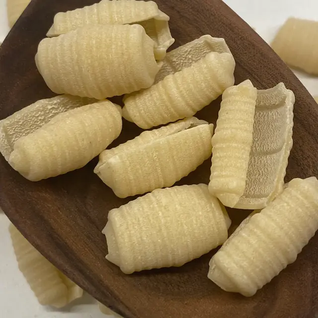 A close up shot of Barilotti in a wooden serving spoon