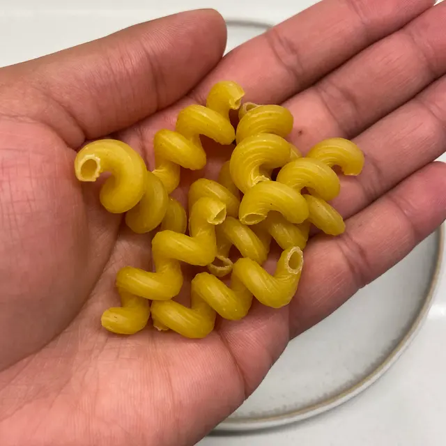 Cavatappi in a hand