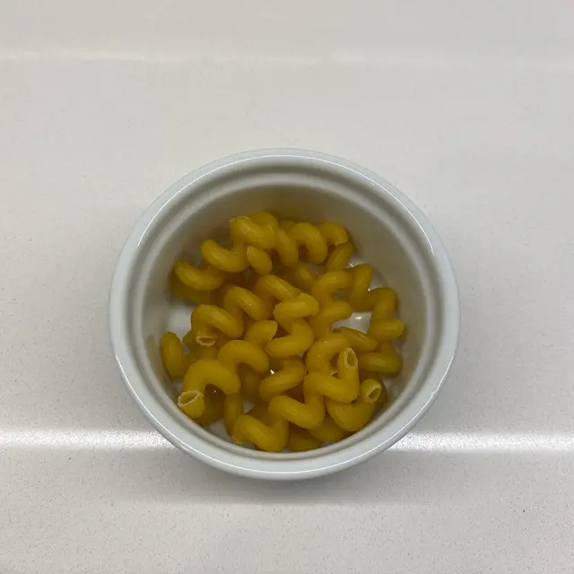 Cavatappi in a round white ramekin