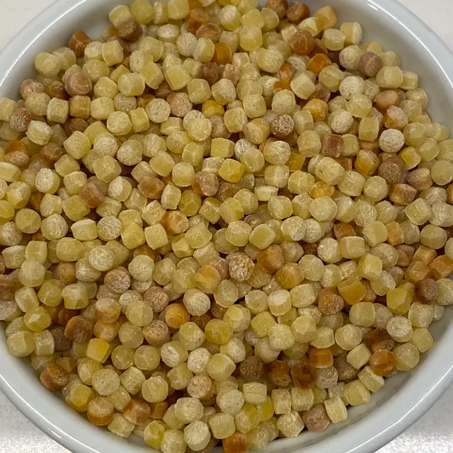 A close up shot of Fregola in a round white ramekin