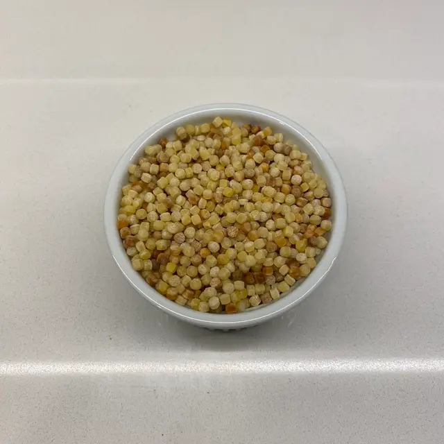 Fregola in a round white ramekin