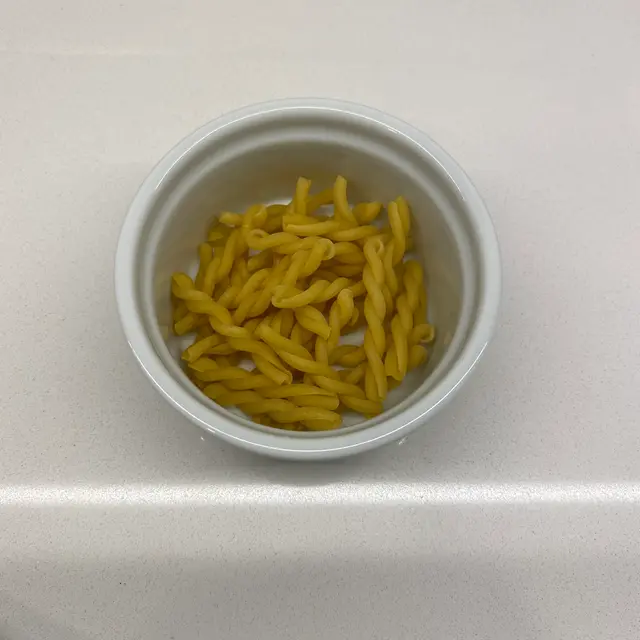 Gemelli in a round white ramekin