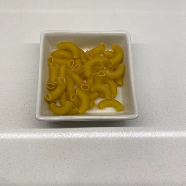 Large Elbow Macaroni in a square white glass bowl