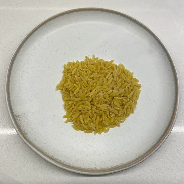 Orzo on a round white plate