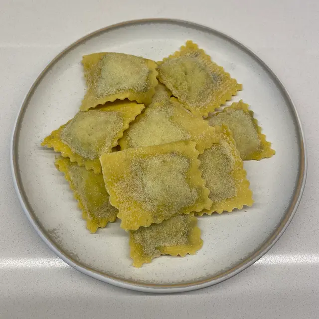 Ravioli on a round white plate