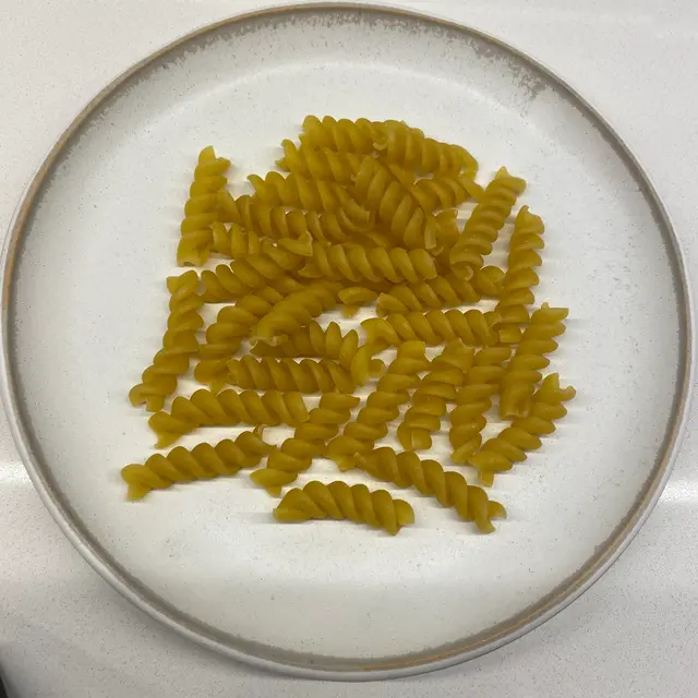 Rotini on a round white plate