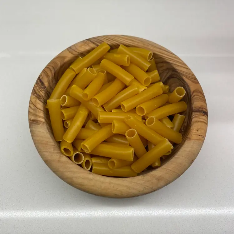 Ziti in a round wooden bowl