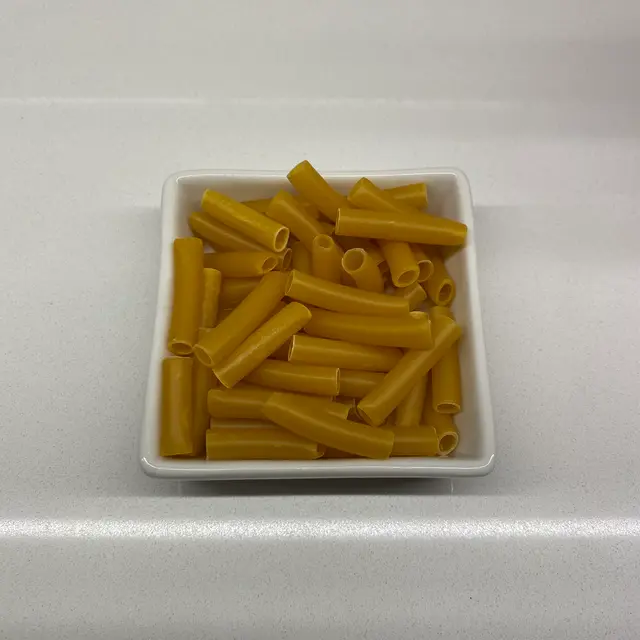 Ziti in a square white glass bowl