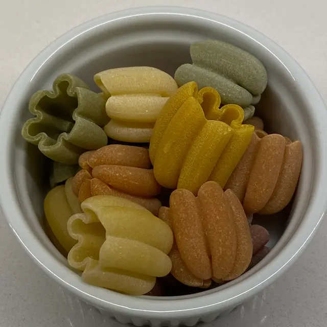 A close up shot of Zucchiette in a round white ramekin