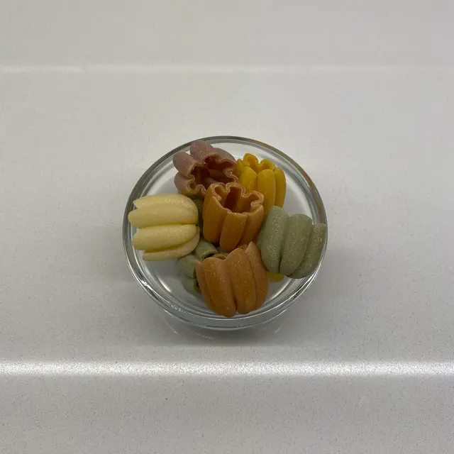 Zucchiette in a small round white glass bowl