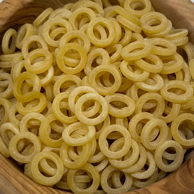 A close up shot of Anelli in a round wooden bowl