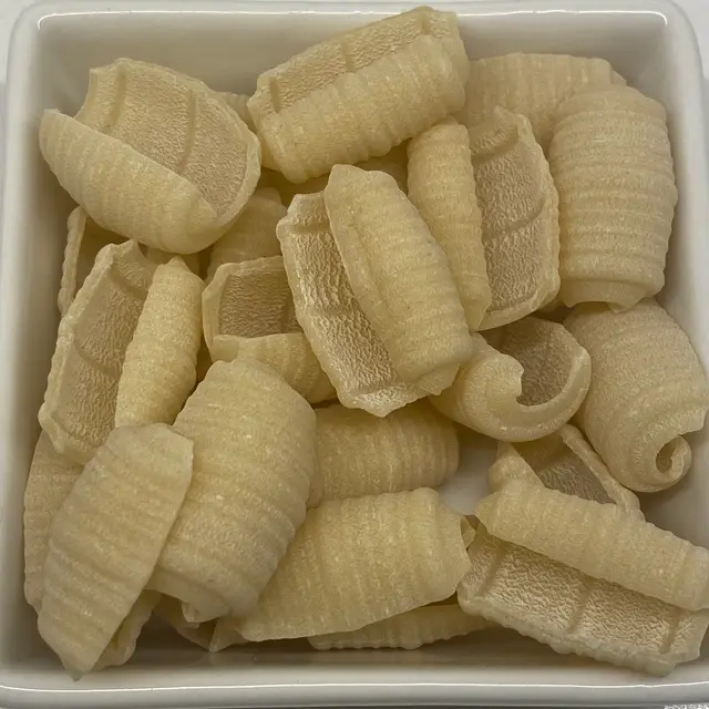 A close up shot of Barilotti in a square white glass bowl