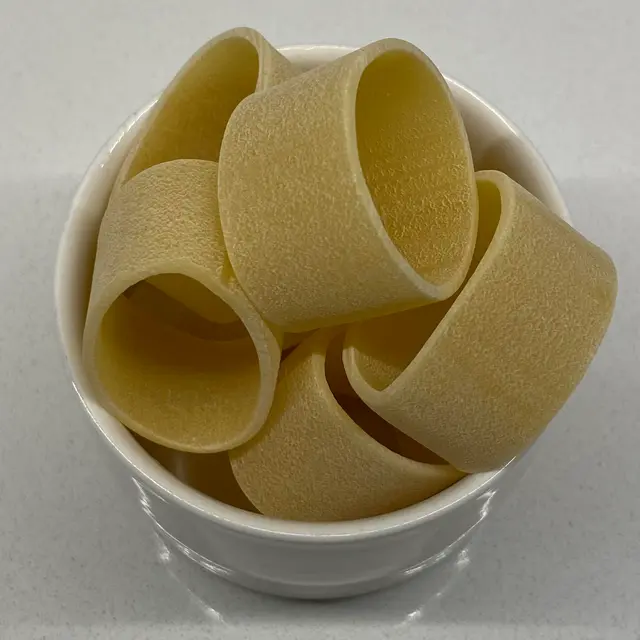 Calamarata in a small white bowl