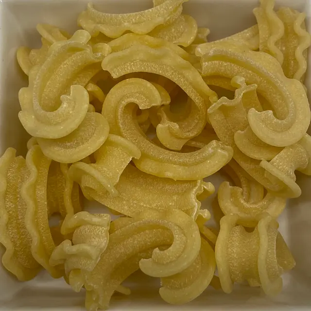 A close up shot of Cascatelle in a square white glass bowl