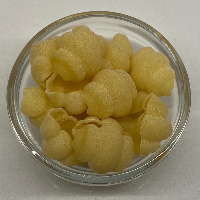 A close up shot of Cestini in a small round white glass bowl