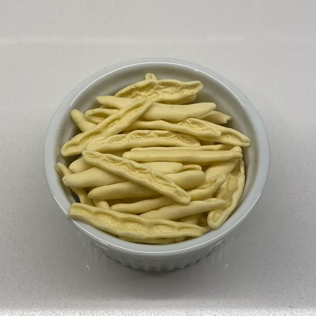 A close up shot of Foglie d’ulivo in a round white ramekin