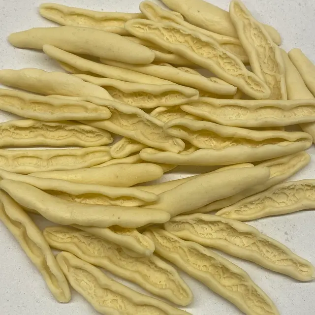 A close up shot of Foglie d’ulivo on a round white plate